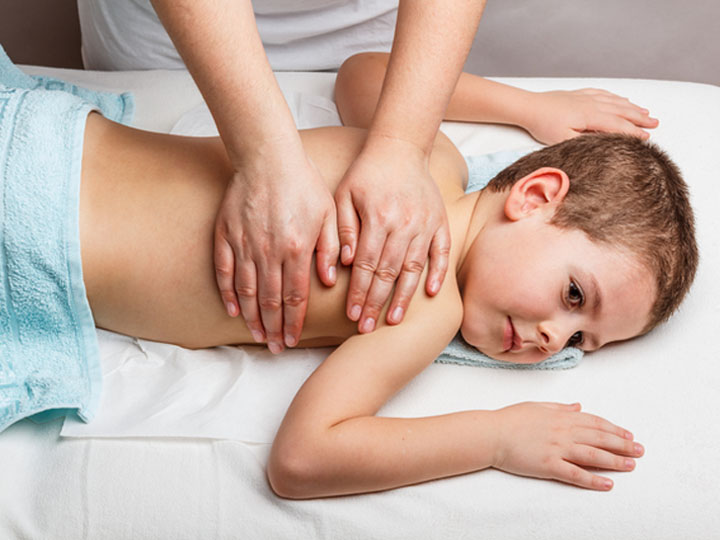 Child receiving a massage